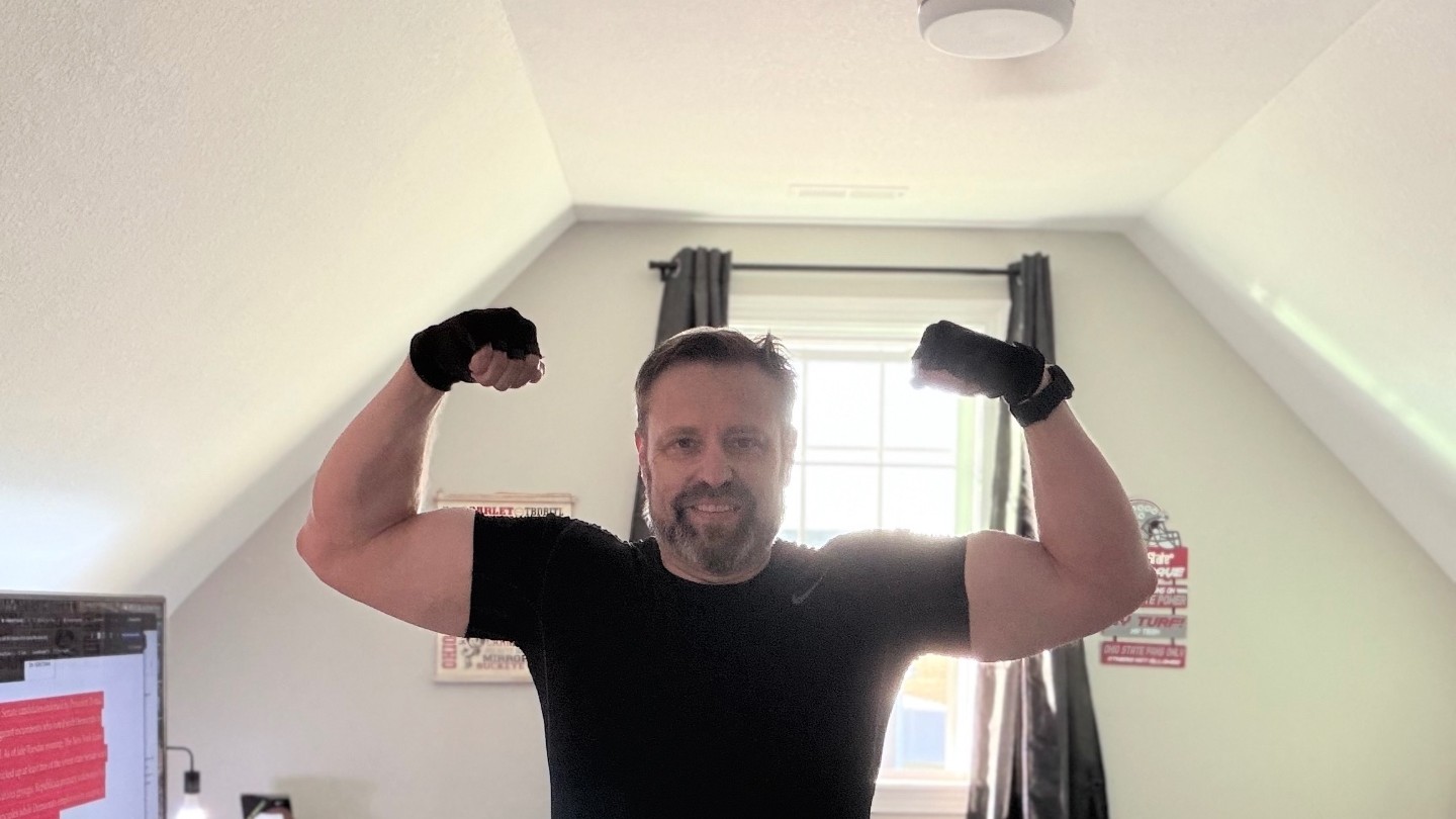 Dr. Matt Sharples flexing